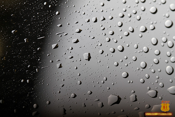 Old81studios_IMG_0436_water_drops_on_glass_that_looks_as_if_shot_from_outer_space