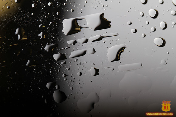 Old81studios_IMG_0438_water_drops_on_glass_that_looks_as_if_shot_from_outer_space