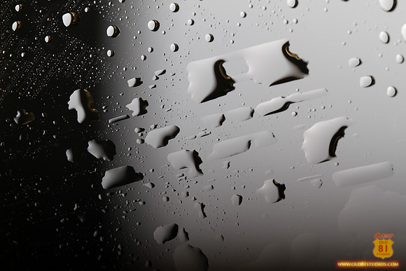 Old81studios_IMG_0437_water_drops_on_glass_that_looks_as_if_shot_from_outer_space